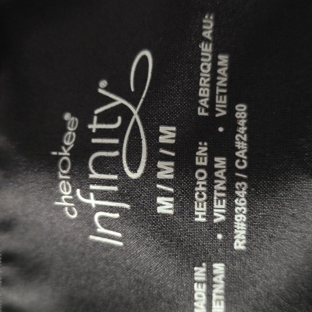 Cherokee Infinity Heart Patterned Black Scrub Top - image 2